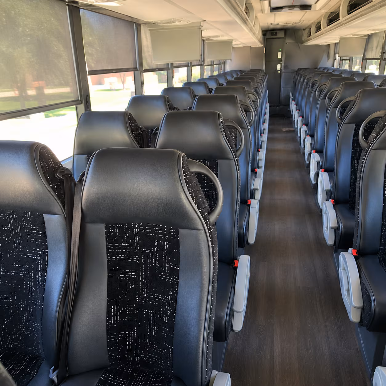 long distance charter buses for raleigh fan groups traveling to away games